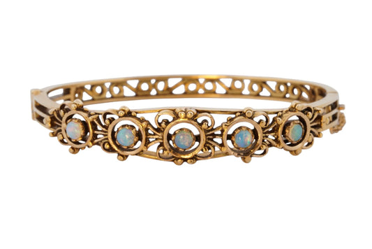 Vintage handmade 14K yellow gold opal bangle bracelet, 360-degree view frame 1 of 36