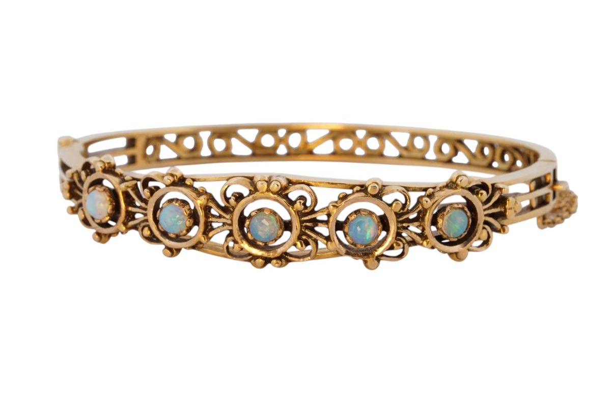 Vintage handmade 14K yellow gold opal bangle bracelet, 360-degree view frame 2 of 36
