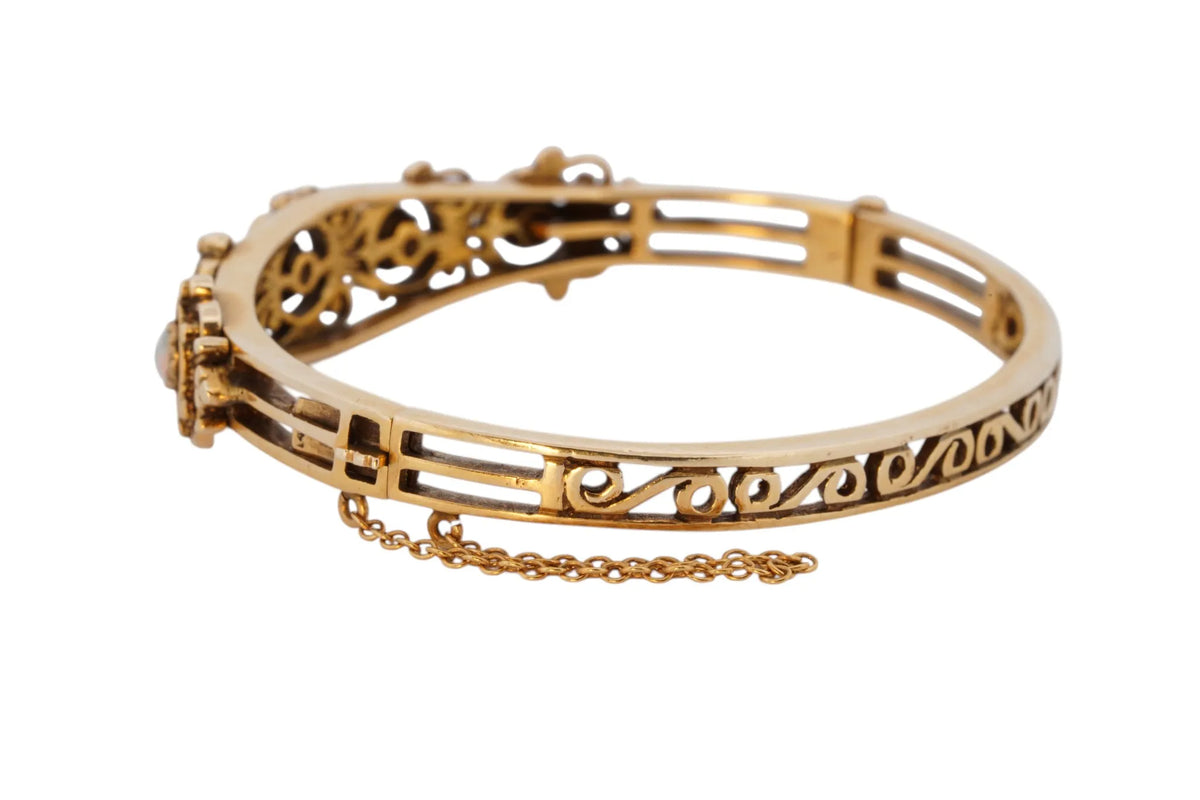 Vintage handmade 14K yellow gold opal bangle bracelet, 360-degree view frame 13 of 36