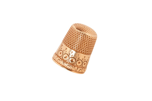 Antique 10K gold thimble with decorative border